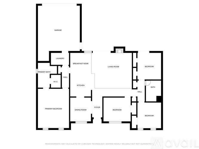 A floor plan of a house with a garage, laundry room, breakfast nook, living room, dining room, kitchen, and multiple bedrooms.