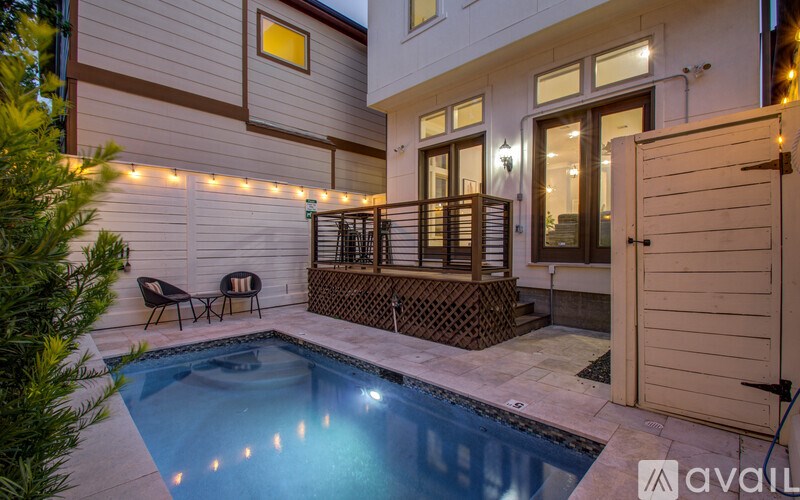 A house with a pool in the backyard.