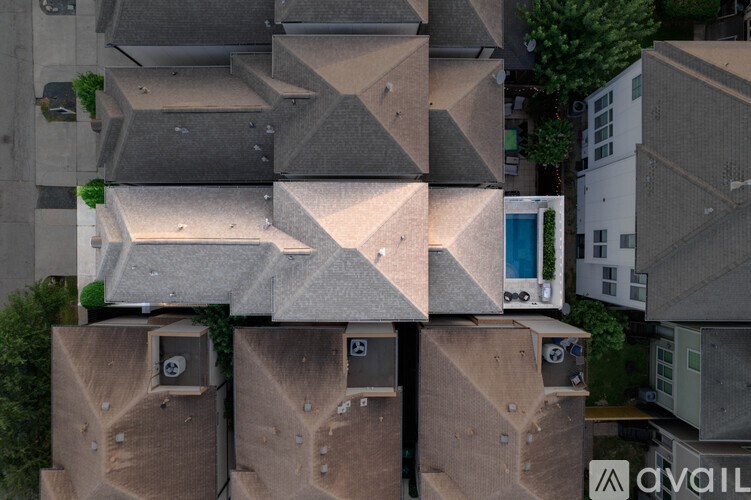 A series of concrete blocks with a small green plant growing out of one of them.
