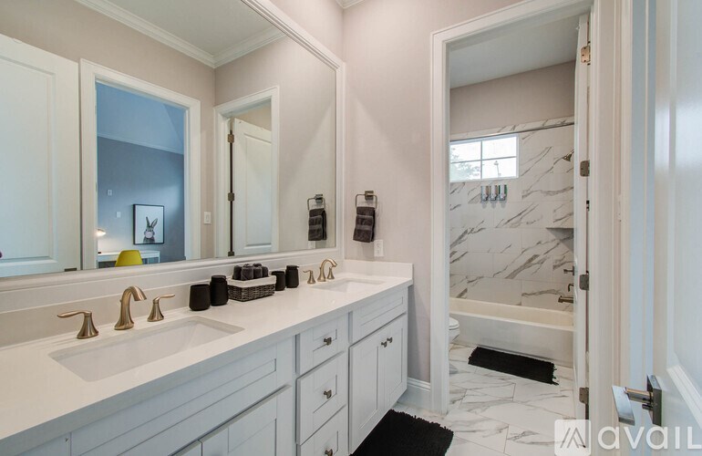 A patio with a fire pit and a couch.