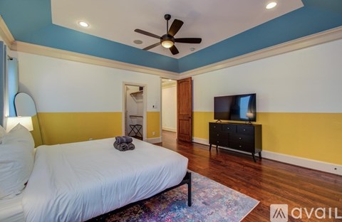 A bedroom with a bunk bed and a single bed.
