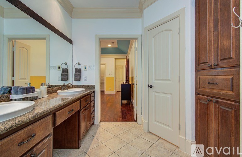 A pool in a backyard of a house.