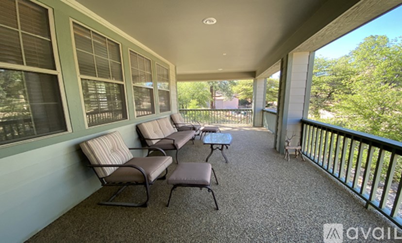 A patio with a table and chairs is available for rent.