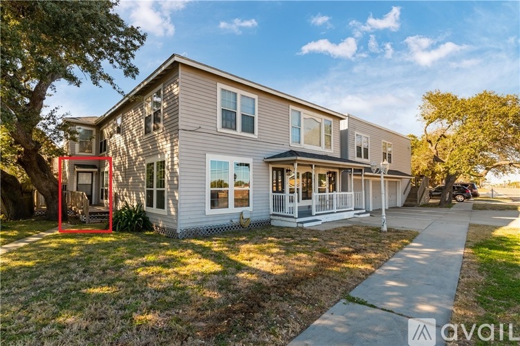 A house with a red frame is for sale.