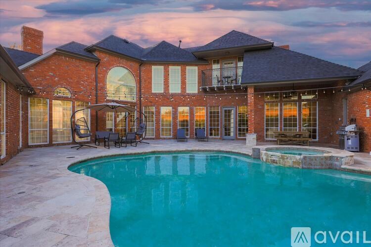 A house with a pool in the backyard.