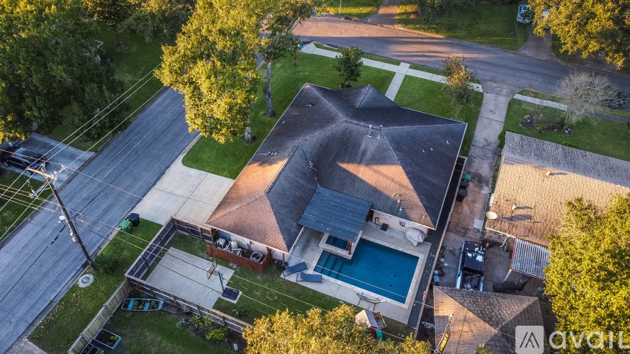 A house with a pool in the backyard.