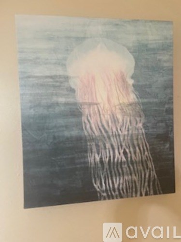 A jellyfish is depicted in a painting with a blurred background.