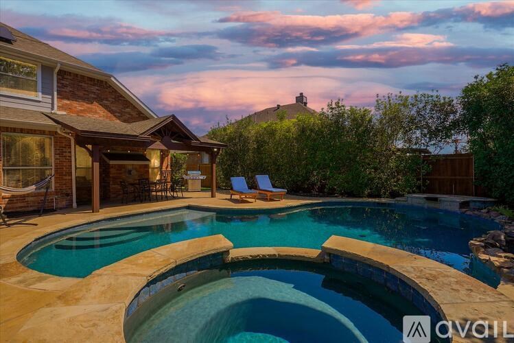 A house with a swimming pool in the backyard.