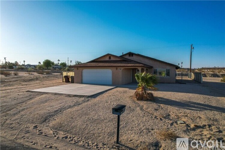 A house with a garage is available for sale.