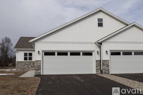 A two-car garage is attached to a house.