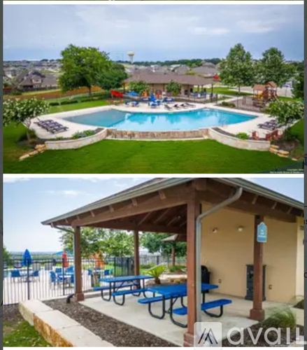 A pool and a pavilion with picnic tables.