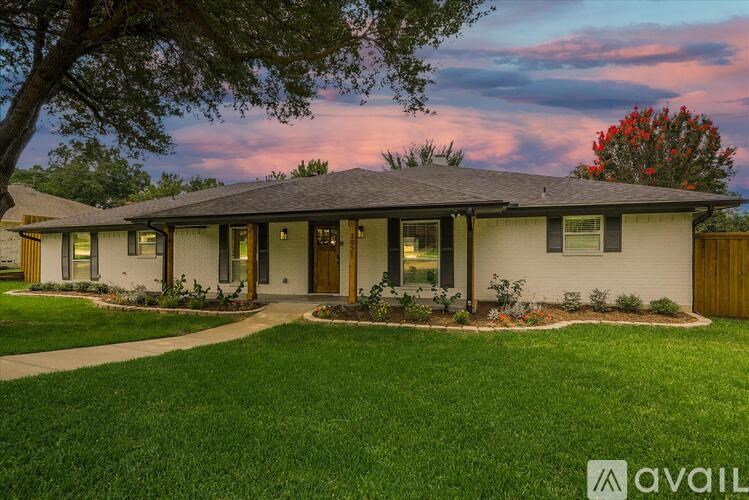 A house with a lawn in front of it is available for sale.
