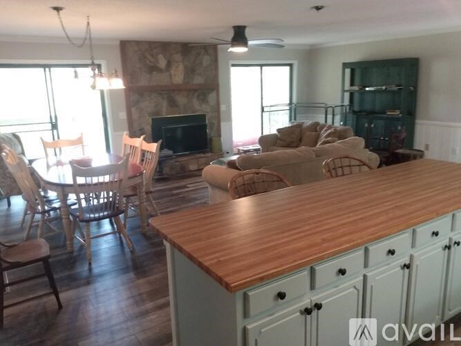 A living room with a fireplace and a couch.