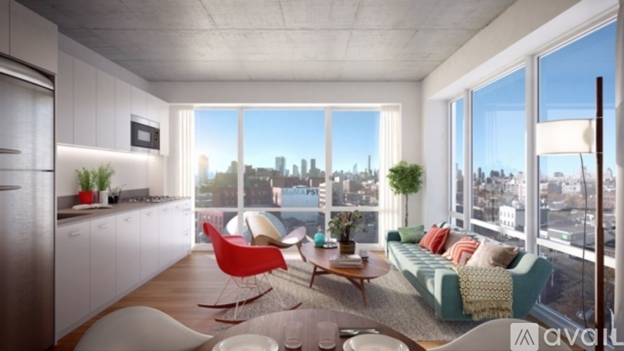 A modern living room with a view of the city skyline.