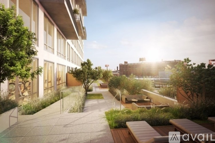 A sunny day at the outdoor seating area of a modern building.