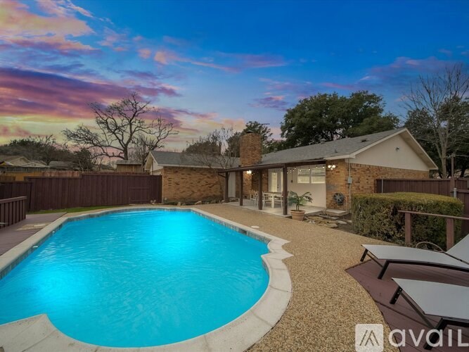 A house with a swimming pool in the backyard.