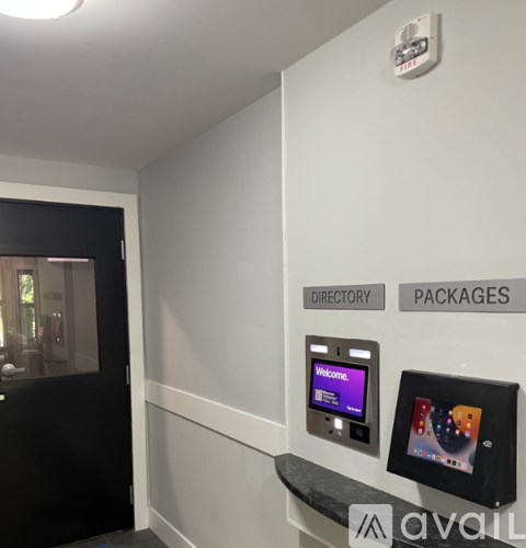 A wall with directory and packages written on it.