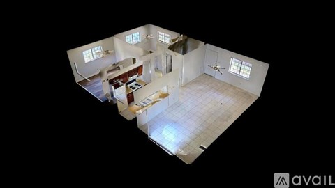A 3D image of a house interior with a kitchen, living room, and two bedrooms.