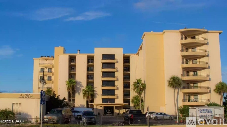 A multi-story building with a sign that reads "Laurel" in front of it.
