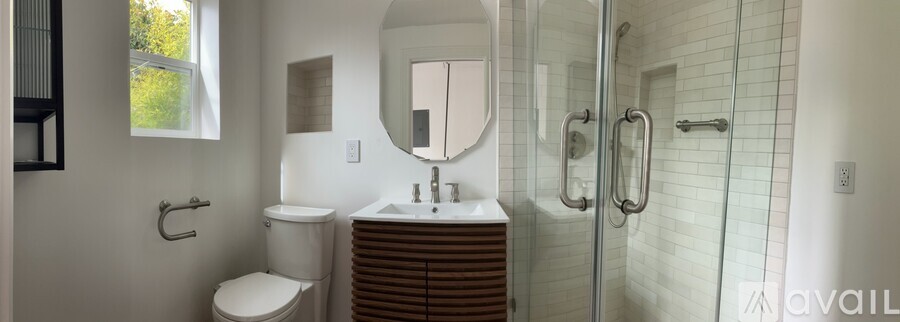 A room with a doorway leading to another room.