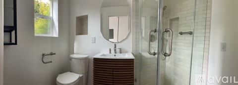 A room with a doorway leading to another room.