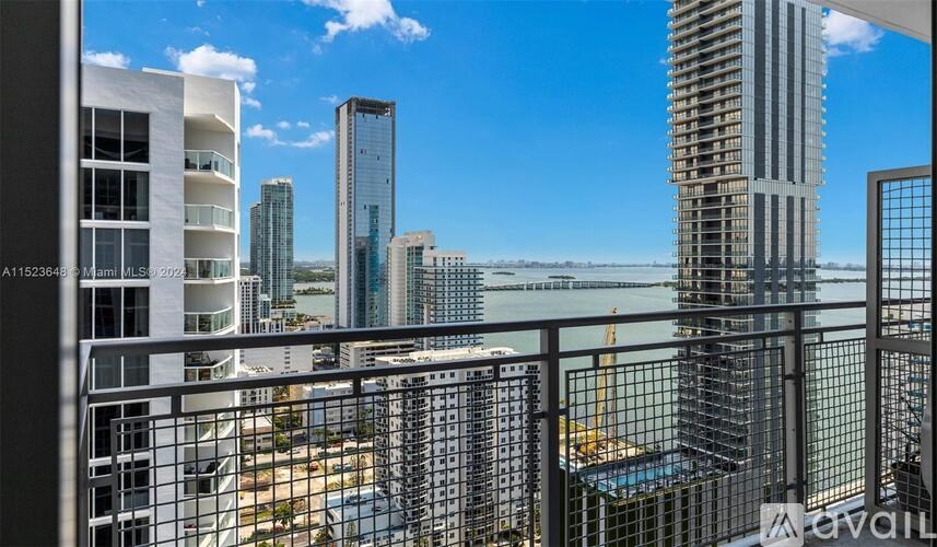 A view of a cityscape from a high-rise building.