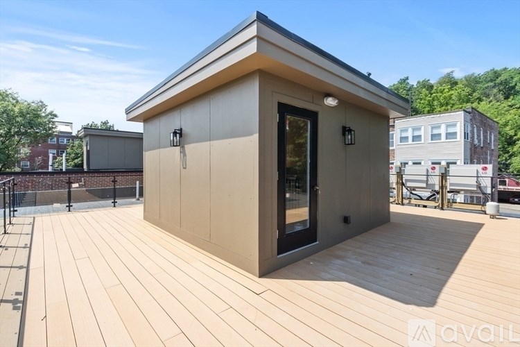 A small cabin with a deck is available for rent.