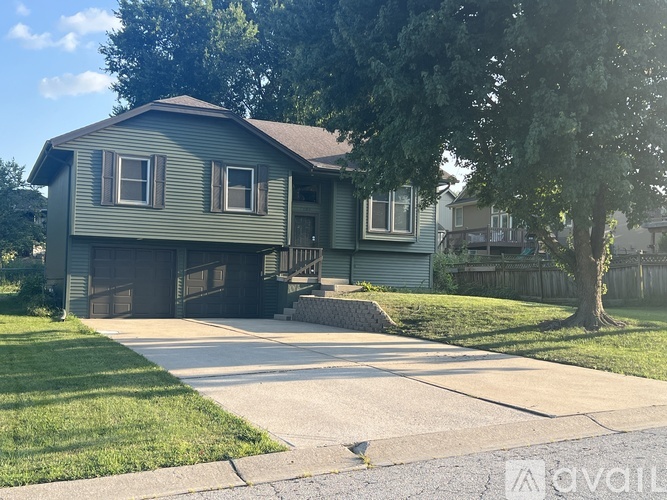 A house with a red and white striped window is for sale.
