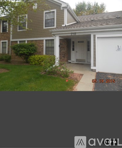 A house with a white door and windows.