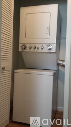 A white dryer and washer are available for rent.