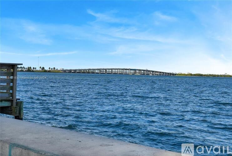 A long bridge spans across a body of water.
