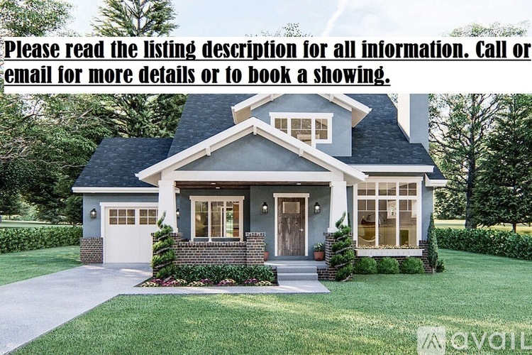 A house with a grey roof and a white garage door is for sale.