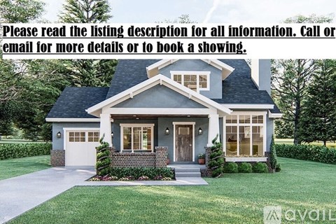 A house with a grey roof and a white garage door is for sale.