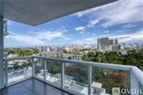 A balcony with a view of a cityscape.
