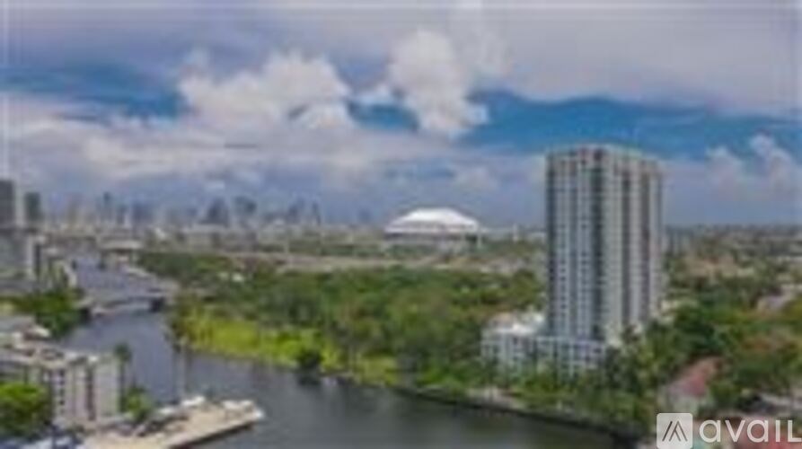A cityscape with a river running through it.