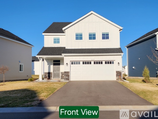 A house with a front view is available for sale.