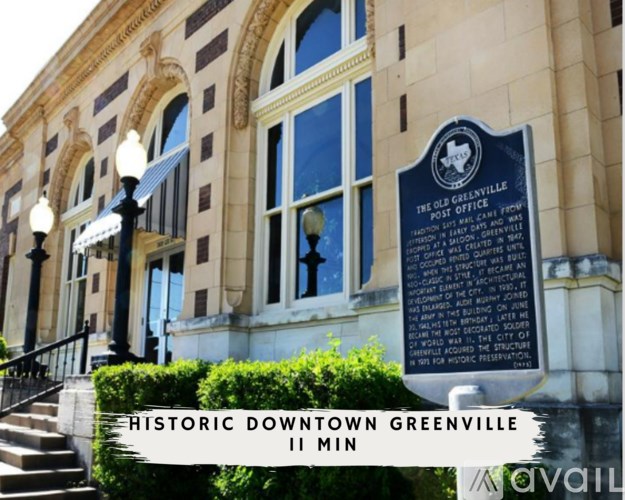 A sign in front of a building that says Historic Downtown Greenville.
