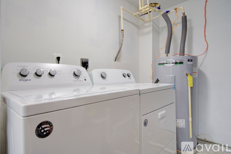 A Whirlpool washing machine and dryer are available for purchase.