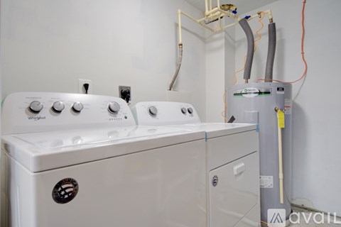 A Whirlpool washing machine and dryer are available for purchase.