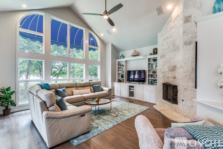 A living room with a fireplace and a couch.