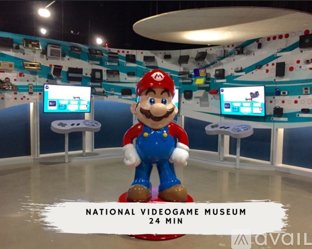 A video game museum with a Mario statue in the middle.