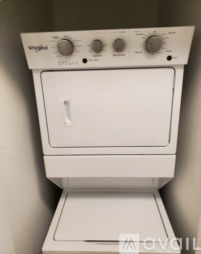 A white Whirlpool oven with a control panel on top.