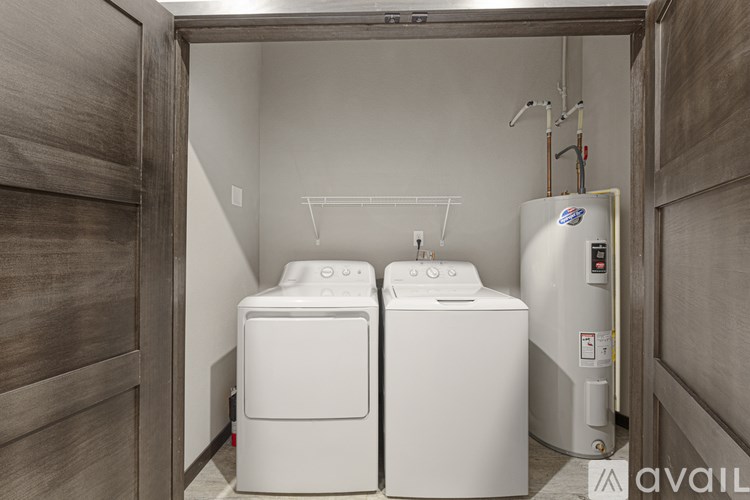 A laundry room with a washer and dryer.