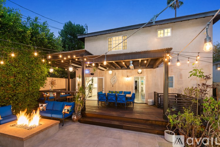 A house with a patio and a fire pit.