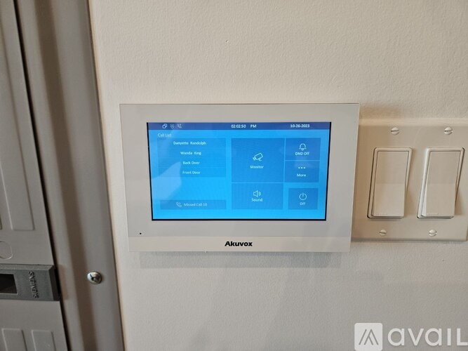 A white panel with a blue screen and the word Avaux on it.