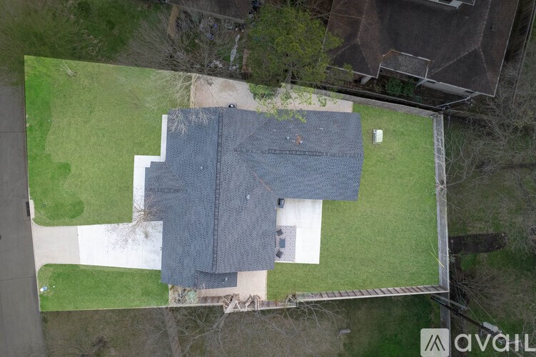 A large grey tarp is covering a building.
