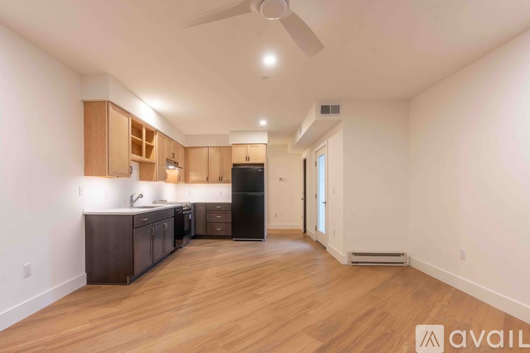 A floor plan of a unit with a balcony and a bathroom.