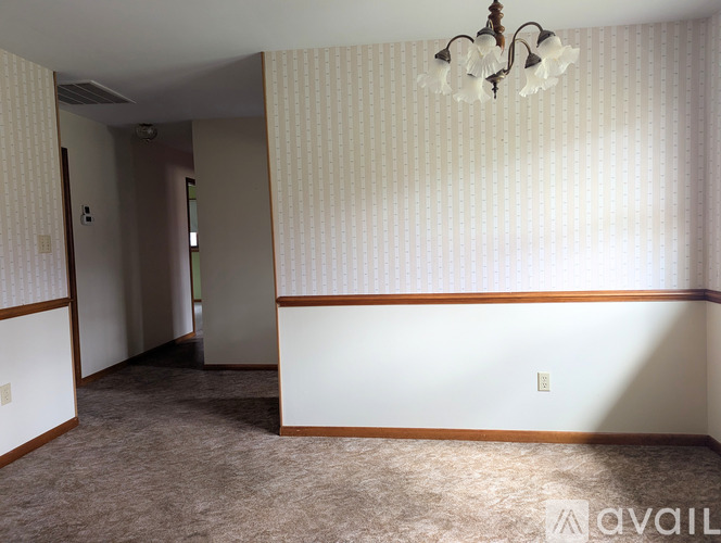 A room with a washer and dryer set up in it.