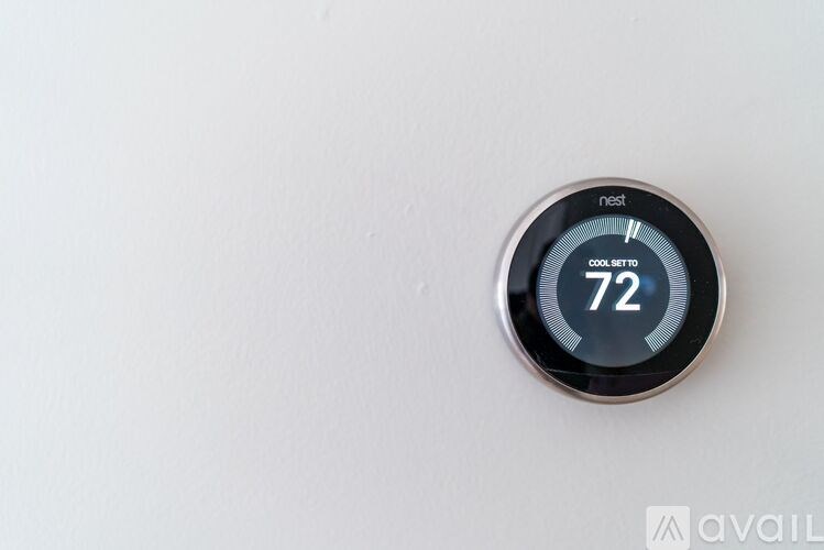 A Nest thermostat set to 72 degrees.