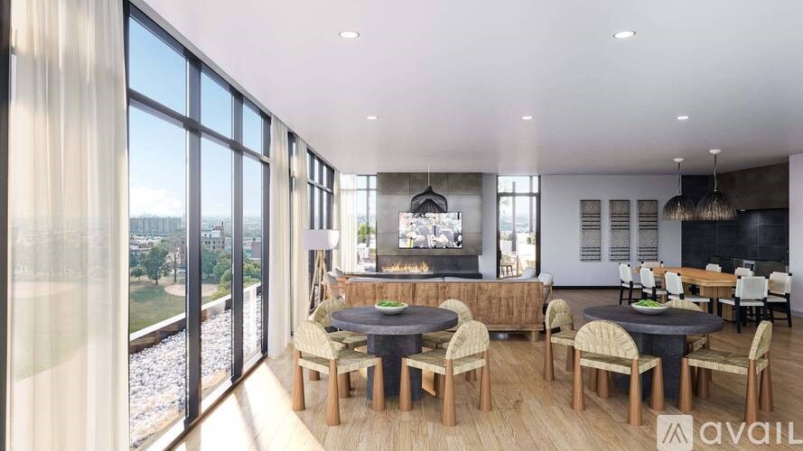 A modern dining room with a large table and chairs.